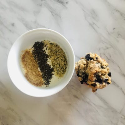 Homemade blueberry muffin with yogurt, ground flax, Chia seeds, and hemp seeds