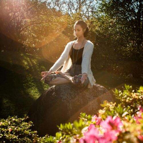 woman meditating outside
